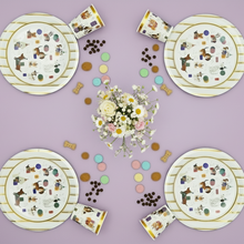 Load image into Gallery viewer, Set of paper plates and cups with dog illustrations on a purple background