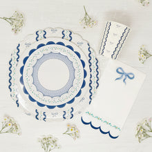 Load image into Gallery viewer, Floral and bow detail on blue scalloped paper napkins for baby showers and baptisms
