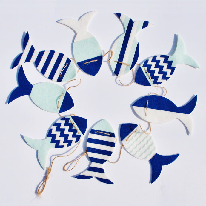 White Blue and mint Fish Garland top view in circle - Pooka Party